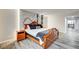 Bedroom features a striking marble accent wall and a city view through a large window at 205 E Harmon Ave # 1010, Las Vegas, NV 89169