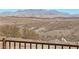 Stunning desert vista from the backyard featuring rugged mountains and natural landscapes, offering a tranquil and scenic backdrop at 21 Via Mantova # 3, Henderson, NV 89011