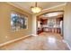 Bright dining room with a view into the kitchen at 21 Via Mantova # 3, Henderson, NV 89011