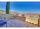 Outdoor patio with brick pavers and open views of the surrounding desert landscape at 21 Via Mantova # 3, Henderson, NV 89011