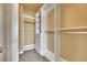 Bright walk-in closet with adjustable shelving and drawers, offering ample storage space at 21 Via Mantova # 3, Henderson, NV 89011