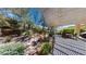 Scenic backyard with a charming rock garden and an inviting patio at 2309 Aztec Ruin Way, Henderson, NV 89044
