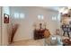 Dining area features shuttered windows and a decorative hutch with a glass table at 2309 Aztec Ruin Way, Henderson, NV 89044