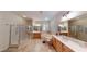 Bright main bathroom featuring dual vanities, a soaking tub, and a separate shower at 2309 Aztec Ruin Way, Henderson, NV 89044