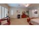 Spacious main bedroom with natural light, neutral carpet and wood furniture at 2309 Aztec Ruin Way, Henderson, NV 89044