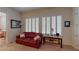 Cozy sitting area features natural light, comfortable seating, and a functional table at 2309 Aztec Ruin Way, Henderson, NV 89044