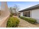 Low maintenance backyard featuring gravel landscaping, bushes, and privacy fence at 26 Moraine Dr, Henderson, NV 89052