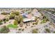 Backyard featuring a covered patio, garden area, manicured lawn, and artificial turf in a residential neighborhood at 2971 Fort Matanzas Ter, Henderson, NV 89052