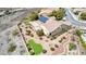 Back aerial view of home featuring backyard oasis, solar panels, and lush landscaping at 2971 Fort Matanzas Ter, Henderson, NV 89052