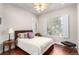 Cozy bedroom with bright windows, shutters and a ceiling fan, ideal for relaxation at 2971 Fort Matanzas Ter, Henderson, NV 89052
