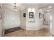 Inviting foyer with double doors, marble floors, neutral paint, and decorative niche with lighting at 2971 Fort Matanzas Ter, Henderson, NV 89052
