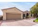 Charming single-story home with brick-paved driveway, well-kept lawn and two-car garage at 2971 Fort Matanzas Ter, Henderson, NV 89052