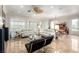 Spacious living room featuring shiny marble floors, neutral walls, and plantation shutters at 2971 Fort Matanzas Ter, Henderson, NV 89052