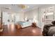 Comfortable primary bedroom featuring hardwood floors and doors to the bathroom at 2971 Fort Matanzas Ter, Henderson, NV 89052