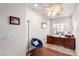 Bright office space with a ceiling fan, a large window, and ample desk space at 2971 Fort Matanzas Ter, Henderson, NV 89052