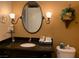 Bathroom with vanity, mirror, and toilet at 30 Strada Di Villaggio # 439, Henderson, NV 89011