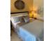 Well-appointed bedroom featuring a decorative headboard, soft bedding and neutral tones for a calming retreat at 30 Strada Di Villaggio # 439, Henderson, NV 89011