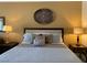 Comfortable bedroom showcasing a well-made bed, side tables and lamps creating a relaxing atmosphere at 30 Strada Di Villaggio # 439, Henderson, NV 89011