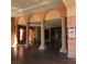 Elegant building entrance featuring tiled floors, columns, and signage for Viera Private Residences at 30 Strada Di Villaggio # 439, Henderson, NV 89011