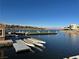 Scenic lake view with boats, docks, and waterfront properties against a clear sky at 30 Strada Di Villaggio # 439, Henderson, NV 89011