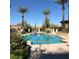 Sparkling community pool with plenty of space to relax in the desert sun at 30 Strada Di Villaggio # 439, Henderson, NV 89011