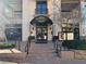 Entrance to a restaurant, featuring steps, signage and outdoor seating at 30 Strada Di Villaggio # 439, Henderson, NV 89011