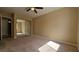 Bedroom with carpet flooring, a ceiling fan, and a closet with sliding doors at 3407 Bristlecone St, Las Vegas, NV 89146
