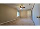 Bedroom with carpet flooring, a ceiling fan, and a window offering natural light at 3407 Bristlecone St, Las Vegas, NV 89146