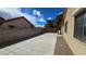 Extended concrete driveway running alongside the house with a decorative rock bed at 3407 Bristlecone St, Las Vegas, NV 89146