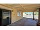 Covered outdoor patio with sliding glass door, brick accents and ample space for entertaining at 3407 Bristlecone St, Las Vegas, NV 89146