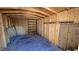 Interior view of a wood shed featuring shelving and ample storage space at 3407 Bristlecone St, Las Vegas, NV 89146