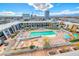 Aerial view of pool and city buildings and surrounding landscaping at 353 E Bonneville Ave # 125, Las Vegas, NV 89101