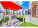 Comfortable sunbeds with sun shades available at the pool and garden areas at 353 E Bonneville Ave # 125, Las Vegas, NV 89101