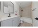 Beautiful bathroom with a gray vanity, tiled shower, and matte black finishes at 3597 Arville St # 201B, Las Vegas, NV 89103