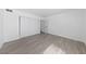 A well-lit room featuring a closet with sliding doors and neutral walls at 3597 Arville St # 201B, Las Vegas, NV 89103