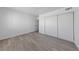 A well-lit room featuring a closet with sliding doors and neutral walls at 3597 Arville St # 201B, Las Vegas, NV 89103