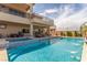 Backyard with a stunning pool, spa, and plenty of space for outdoor enjoyment at 386 Cactus River Ct, Henderson, NV 89052