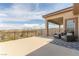 Expansive balcony featuring comfortable seating and scenic views of the desert landscape at 386 Cactus River Ct, Henderson, NV 89052