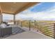 Spacious balcony with comfortable seating and stunning views of the surrounding landscape at 386 Cactus River Ct, Henderson, NV 89052