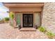Charming front entrance featuring a double door, side windows and lion statues at 386 Cactus River Ct, Henderson, NV 89052