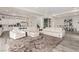 Open-concept living space with a large sectional sofa, adjacent to the kitchen and dining area at 386 Cactus River Ct, Henderson, NV 89052