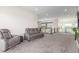 Upstairs loft area featuring multiple seating options and recessed lighting at 386 Cactus River Ct, Henderson, NV 89052
