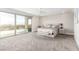 Light-filled main bedroom with a private balcony and plush decor at 386 Cactus River Ct, Henderson, NV 89052