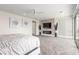 Relaxing main bedroom featuring an entertainment center and an adjacent balcony at 386 Cactus River Ct, Henderson, NV 89052
