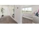 Bright bedroom with large windows, neutral carpet, and a serene view at 386 Cactus River Ct, Henderson, NV 89052