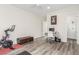 A home office and gym featuring a ceiling fan and wood flooring at 386 Cactus River Ct, Henderson, NV 89052