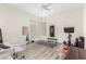 A home office and gym combination with modern ceiling fan and wood flooring at 386 Cactus River Ct, Henderson, NV 89052