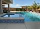 Beautiful pool and spa featuring lovely tiled accents at 386 Cactus River Ct, Henderson, NV 89052