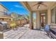 Covered patio featuring landscaped backyard with well-manicured trees at 3925 Kettle Falls Ave, North Las Vegas, NV 89085