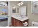 This bathroom features a double vanity with modern fixtures and neutral walls at 3925 Kettle Falls Ave, North Las Vegas, NV 89085